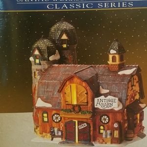Never used porcelain Christmas lighted house/barn.